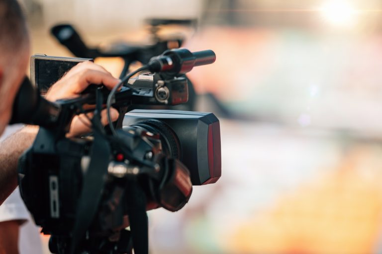 Public Live Event. Television cameras at a press conference outdoors